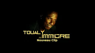 Toualy - Immigré