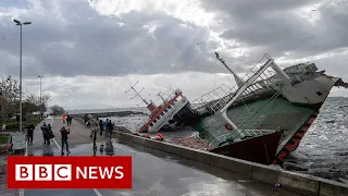 Man dodges falling concrete as storm tears through Turkey - BBC News