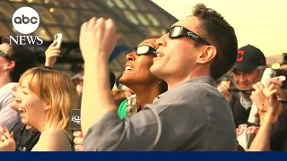 Total solar eclipse wows the crowd gathered outside the Rock & Roll Hall of Fame in Cleveland, Ohio