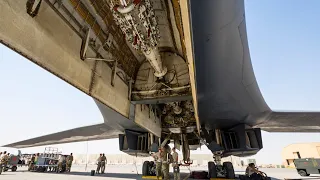 The monstrously powerful B-1B Lancer. Loading cruise missiles and precision bombs.