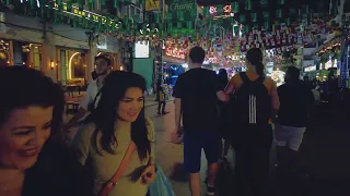 Khao San Road the Party Street in Bangkok Thailand - 4K People Watching