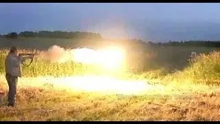 Dragon's breath shotgun round at night in slow motion, 300 frames/sec