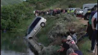 Video shows officers, strangers jump into water to rescue 12 year old in Utah reservoir