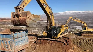 Caterpillar 365C Excavator Loading Mercedes And MAN Trucks