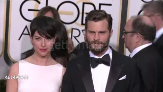 January 11th, 2015 - JAMIE DORNAN on the red Carpet at Golden Globes