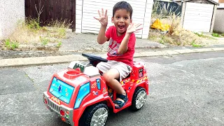 Little Boy Fire Engine Ride on Power Wheel Playtime