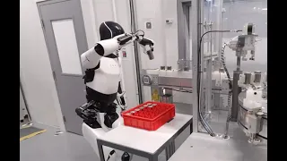 Tesla Optimus humanoid robot demo May 2024