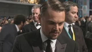 BAFTAs 2014: Leonardo DiCaprio laughs at chanting fans on the red carpet in London