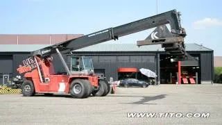 tito.com // 2008 Kalmar reach stacker DRF 450-60 S5 lifting the boom and rotating the spreader