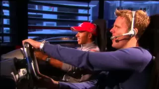Lewis Hamilton plays Codemasters' F1 2010 game