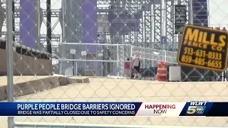 Walkers, cyclists ignoring safety barriers along Purple People Bridge amid repairs