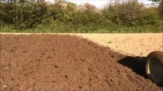 John Deere 1040 ploughing