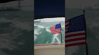 Flag under Gordie Howe Bridge 7/16/2023