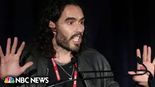 Russell Brand postpones tour, denies accusations of sexual assault