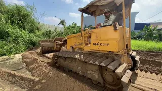 Completed New Project Land fill By a Bulldozer with a few 5 Ton Trucks