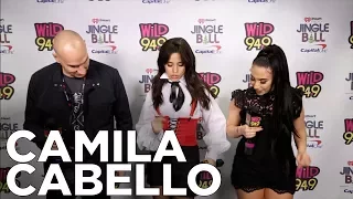 Camila Cabello talks with JV and Selena backstage at The WiLD 94.9 Jingle Ball 2017