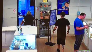 A drunk face plants a sign at the weed shop