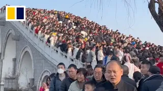 Bridge in China swamped with tourists during Lunar New Year holiday