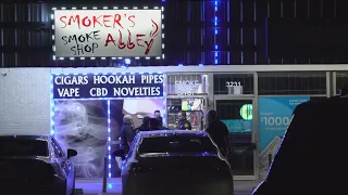 Man in critical condition after being shot four times inside smoke shop