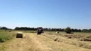 Mx135 round baling