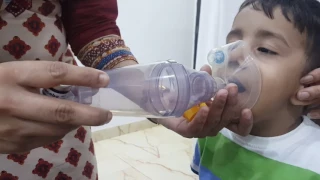 Correct technique of using Spacer and a mask to deliver MDI in a child less than 5 years