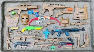 Lots of Guns & Equipment on the dirty field, Super Hero Action Series Guns, Military Guns & more