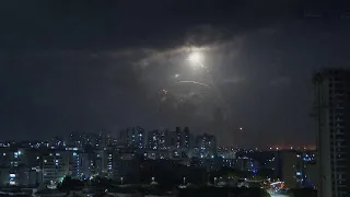 Sirens blare, rockets light up night sky in southern Israel amid war with Hamas