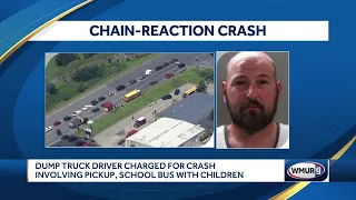 Dump truck driver charged for crash, involving pickup, school bus with children