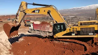 Caterpillar 365C Excavator Loading Trucks With Three Passes