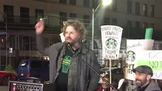 Sonicsgate Director Jason Reid speaks at Protest vs. Howard Schultz in Seattle