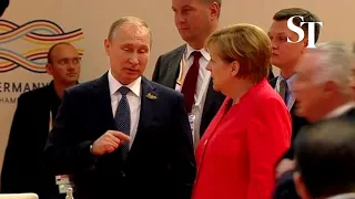 Angela Merkel gives Vladimir Putin epic eye roll