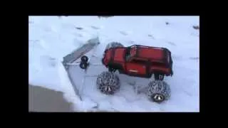 Traxxas Summit Plowing a Sidewalk