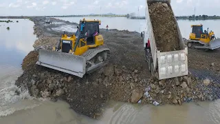 Incredible Bulldozer & Dump Truck In operation Building New Road Over Big Lake ,Dozer moving Stone