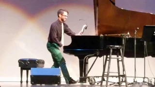 John plays "Someone in the Crowd" (from "La La Land")