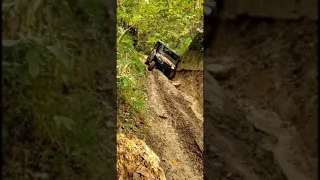 JenElio Down the red trail from Town Rock, Royal Blue.  Honda Pioneer