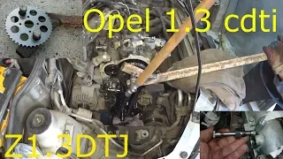 Как открутить болт распредвала  Opel Combo 1. 3 cdti.Z13DTJ .