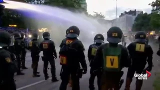 Police scuffle, fire water cannons at G20 protesters in Hamburg, Germany