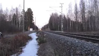 Freight train T 4036 passed SÄRKKÄ (Km.0389+0922) level crossing in Jyväskylä, Finland