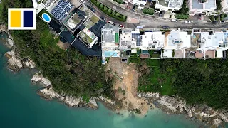 What did a landslide expose at a Hong Kong luxury home?