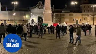 Far-right protesters clash on streets of Rome against Italy's coronavirus curfew