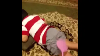 Kid gets slapped by a fly swatter but the kid dies