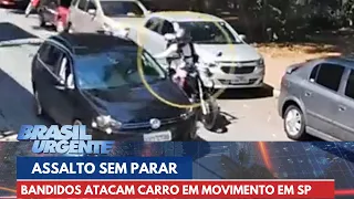 Assalto sem parar: bandidos atacam carro em movimento | Brasil Urgente