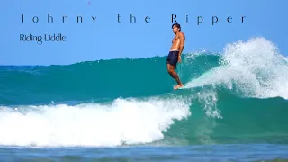 Johnny the Ripper longboards Waikiki.