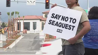 Protestors gather outside of SeaQuest in Folsom, advocate for animal rights