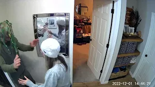 Husband hilariously scares wife, who breaks mirror with hammer due to fright