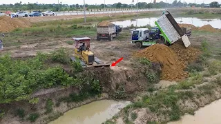 Part 1, Opening Amazing Project Landfill by Bulldozer Komatsu D31 Pushing Soil Stone with Many truck