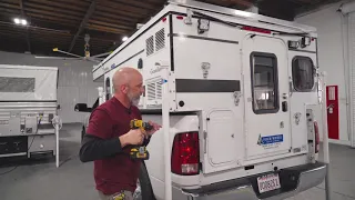 Loading Pop-Up Camper on Truck | Four Wheel Campers, Inc.