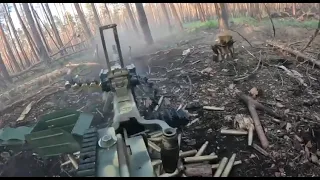 Ukraine - XX.09.2023. Ukrainian Soldier Fires Suppressive Fire With DShK Machine Gun During A Battle