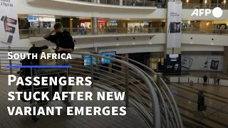 Passengers stuck at Johannesburg airport as new variant sparks travel bans | AFP