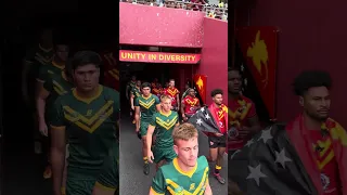Australian Schoolboys and Junior Kumuls coming down the tunnel at the PMs13 in Papua New Guinea